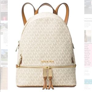 Michael Kors Medium Rhea Backpack.  Vanilla color